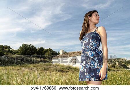 Pretty girl relaxing and enjoy in the wheat field View Large Photo Image Stock Image - Pretty girl relaxing and enjoy in the wheat field. Fotosearch