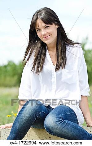 Pretty girl relaxing in the ruralscape and look at camera, Aragon, Spain View Large Photo Image Picture - Pretty girl relaxing in the ruralscape and look at camera, Aragon, Spain. Fotosearch