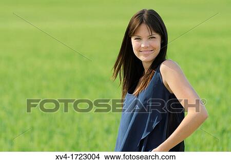 Pretty girl relaxing in the ruralscape and look at camera, Aragon, Spain View Large Photo Image Picture - Pretty girl relaxing in the ruralscape and look at camera, Aragon, Spain. Fotosearch
