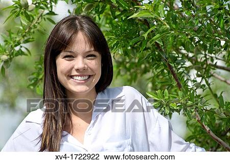Pretty girl relaxing in the ruralscape and look at camera, Aragon, Spain View Large Photo Image Stock Image - Pretty girl relaxing in the ruralscape and look at camera, Aragon, Spain. Fotosearch