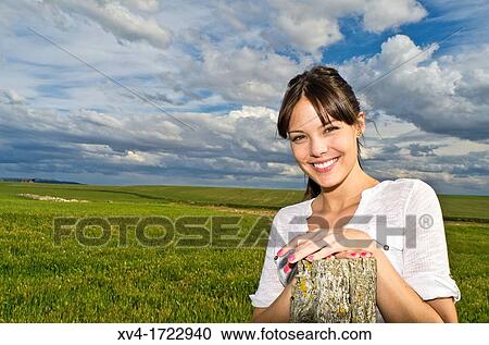 Pretty girl relaxing in the ruralscape and look at camera, Aragon, Spain View Large Photo Image Stock Image - Pretty girl relaxing in the ruralscape and look at camera, Aragon, Spain. Fotosearch
