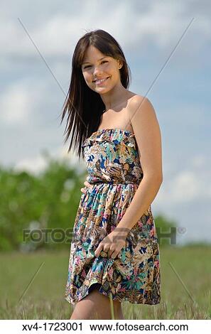 Pretty girl relaxing in the ruralscape and look at camera, Aragon, Spain View Large Photo Image Stock Image - Pretty girl relaxing in the ruralscape and look at camera, Aragon, Spain. Fotosearch