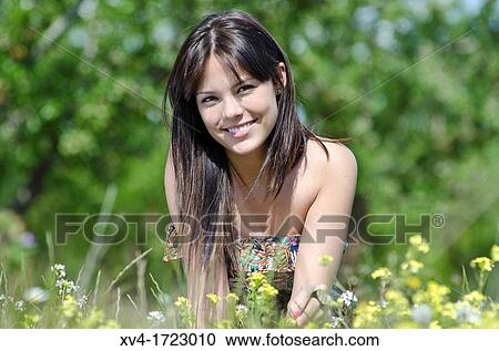 Pretty girl relaxing in the ruralscape and look at camera, Aragon, Spain View Large Photo Image Stock Image - Pretty girl relaxing in the ruralscape and look at camera, Aragon, Spain. Fotosearch
