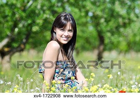 Pretty girl relaxing in the ruralscape and look at camera, Aragon, Spain View Large Photo Image Stock Photo - Pretty girl relaxing in the ruralscape and look at camera, Aragon, Spain. Fotosearch