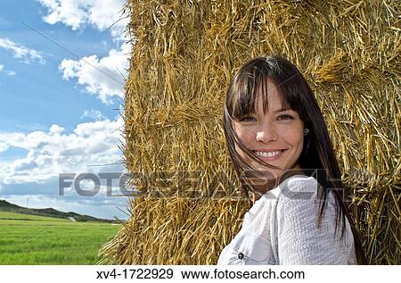 Pretty girl relaxing in the ruralscape and look at camera, Aragon, Spain View Large Photo Image Stock Photo - Pretty girl relaxing in the ruralscape and look at camera, Aragon, Spain. Fotosearch