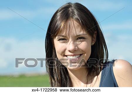 Pretty girl relaxing in the ruralscape and look at camera, Aragon, Spain View Large Photo Image Stock Photo - Pretty girl relaxing in the ruralscape and look at camera, Aragon, Spain. Fotosearch