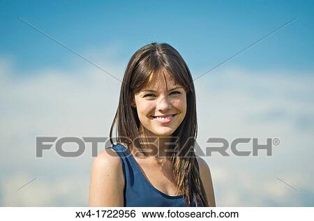 Pretty girl relaxing in the ruralscape and look at camera, Aragon, Spain View Large Photo Image Stock Photograph - Pretty girl relaxing in the ruralscape and look at camera, Aragon, Spain. Fotosearch