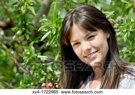 Pretty girl relaxing in the ruralscape and look at camera, Aragon, Spain View Large Photo Image Stock Photography - Pretty girl relaxing in the ruralscape and look at camera, Aragon, Spain. Fotosearch