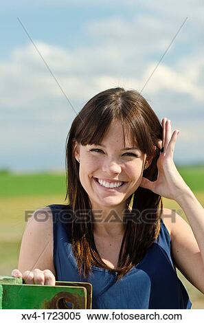 Pretty girl relaxing in the ruralscape and look at camera, Aragon, Spain View Large Photo Image Stock Photography - Pretty girl relaxing in the ruralscape and look at camera, Aragon, Spain. Fotosearch