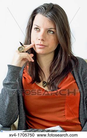 Pretty girl take notes and calculator tasks View Large Photo Image Stock Image - Pretty girl take notes and calculator tasks. Fotosearch