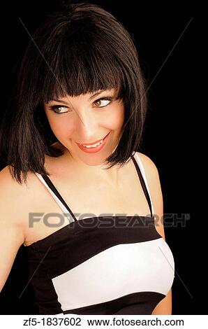 Stock Image - Pretty girl with big beautiful eyes. Fotosearch