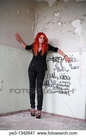pretty redhead girl indoors in obsolete room View Large Photo Image Stock Photo - pretty redhead girl indoors in obsolete room. Fotosearch