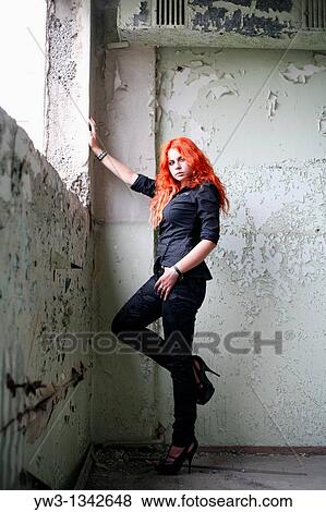 pretty redhead girl indoors in obsolete room View Large Photo Image Stock Photo - pretty redhead girl indoors in obsolete room. Fotosearch