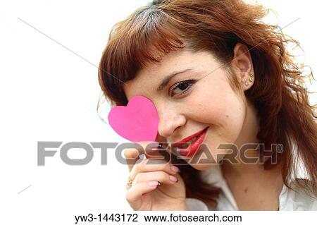 Pretty redhead young woman portrait with heart indoors View Large Photo Image Stock Image - Pretty redhead young woman portrait with heart indoors. Fotosearch