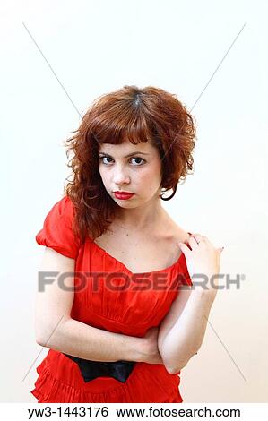 Pretty redhead young woman portrait indoors View Large Photo Image Stock Photograph - Pretty redhead young woman portrait indoors. Fotosearch