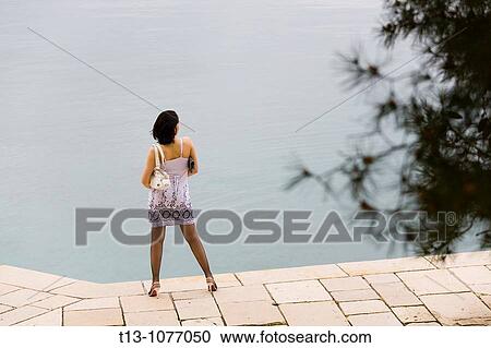 Pretty woman in port View Large Photo Image Stock Image - Pretty woman in port. Fotosearch