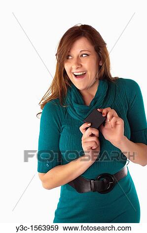 Pretty woman looks surprised when she gets a ring box View Large Photo Image Stock Photo - Pretty woman looks surprised when she gets a ring box. Fotosearch