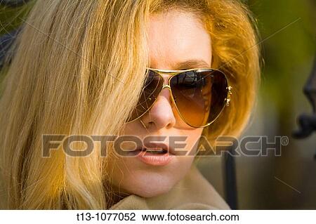 Pretty woman portrait with specs View Large Photo Image Stock Image - Pretty woman portrait with specs. Fotosearch