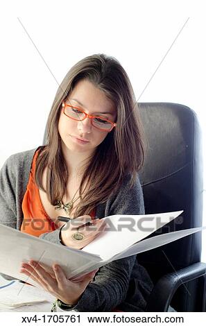 Pretty woman working at company View Large Photo Image Stock Image - Pretty woman working at company. Fotosearch