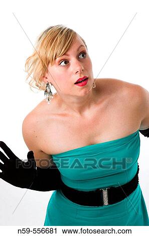 Stock Image - Pretty young woman with concerned exression and body language.. Fotosearch