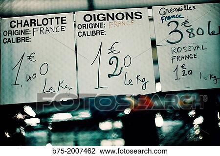 Prices of vegetables at a market in Paris, France View Large Photo Image Stock Image - Prices of vegetables at a market in Paris, France. Fotosearch
