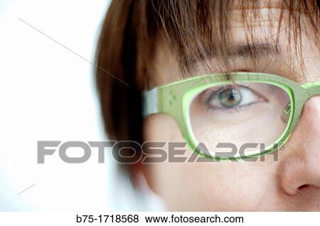 primer plano de cara de mujer joven con gafas y mirando a la camara, close-up of face of young woman with glasses and looking at the camera, View Large Photo Image Stock Photo - primer plano de cara de mujer joven con gafas y mirando a la camara, close-up of face of young woman with glasses and looking at the camera,. Fotosearch