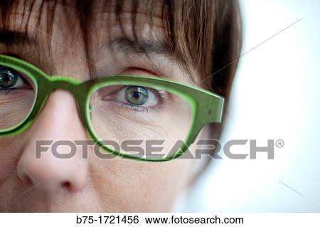 primer plano de cara de mujer joven con gafas y mirando a la camara, close-up of face of young woman with glasses and looking at the camera, View Large Photo Image Stock Photograph - primer plano de cara de mujer joven con gafas y mirando a la camara, close-up of face of young woman with glasses and looking at the camera,. Fotosearch