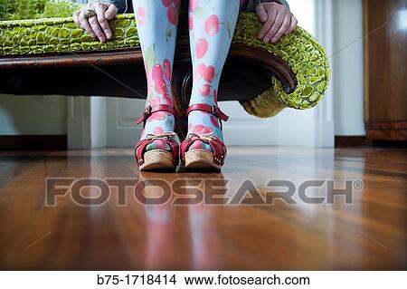 primer plano de piernas con sandalias rojas de mujer sentada, close up of legs of woman sitting with red sandals View Large Photo Image Picture - primer plano de piernas con sandalias rojas de mujer sentada, close up of legs of woman sitting with red sandals. Fotosearch