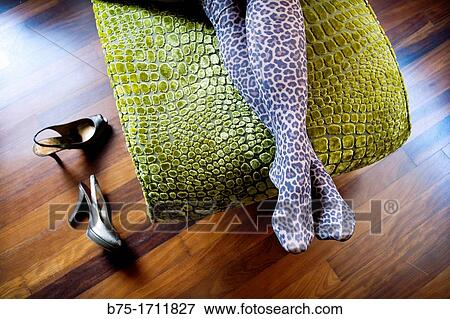 primer plano de piernas cruzadas de mujer tumbada en una chaise longue, close-up cross-legged woman lying on a chaise longue, View Large Photo Image Stock Photo - primer plano de piernas cruzadas de mujer tumbada en una chaise longue, close-up cross-legged woman lying on a chaise longue,. Fotosearch