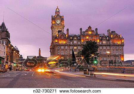 Princes Street, Balmoral Hotel and Carlton Hill in background at dusk, Edinburgh. Lothian Region, Scotland, UK View Large Photo Image Stock Image - Princes Street, Balmoral Hotel and Carlton Hill in background at dusk, Edinburgh. Lothian Region, Scotland, UK. Fotosearch