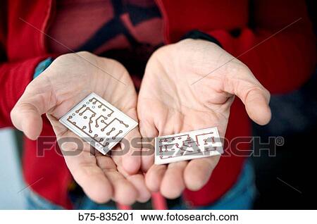 Stock Image - Printed circuit board, PCB. Mechanically support and electrically connect electronic components using conductive pathways, or traces.. Fotosearch