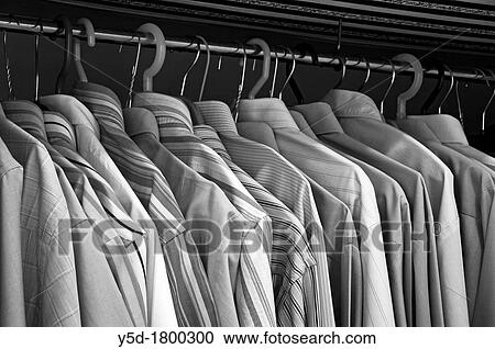 private men's wardrobe full of men's shirts View Large Photo Image Stock Image - private men's wardrobe full of men's shirts. Fotosearch