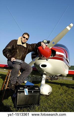 Private pilot posing front of propeller of small plane Robin DR-400, France View Large Photo Image Stock Image - Private pilot posing front of propeller of small plane Robin DR-400, France. Fotosearch