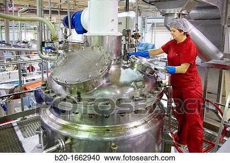 Stock Image - Production line of canned vegetables and beans in glass bottle, Cooked Tomato, Canning Industry, Agri-food, Gutarra, Grupo Riberebro, Villafranca, Navarra, Spain. Fotosearch