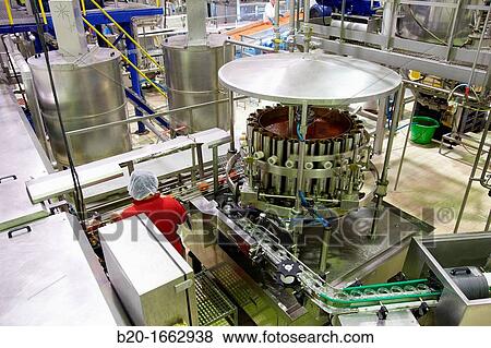 Stock Photo - Production line of canned vegetables and beans in glass bottle, Cooked Tomato, Canning Industry, Agri-food, Gutarra, Grupo Riberebro, Villafranca, Navarra, Spain. Fotosearch