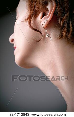 profile of face and neck along with short hair woman on gray background View Large Photo Image Stock Image - profile of face and neck along with short hair woman on gray background. Fotosearch