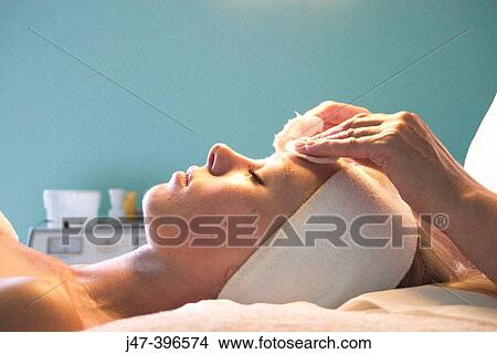 Profile of womans face, having a facial in a salon View Large Photo Image Picture - Profile of womans face, having a facial in a salon. Fotosearch