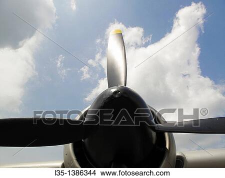Picture - Propeller and white clouds. Fotosearch