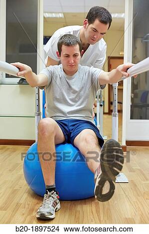 Proprioception exercises knee, ankle, hip or back with medicine ball Gym Physiotherapy medical center, Donostia, San Sebastian, Gipuzkoa, Basque Country, Spain View Large Photo Image Picture - Proprioception exercises knee, ankle, hip or back with medicine ball Gym Physiotherapy medical center, Donostia, San Sebastian, Gipuzkoa, Basque Country, Spain. Fotosearch