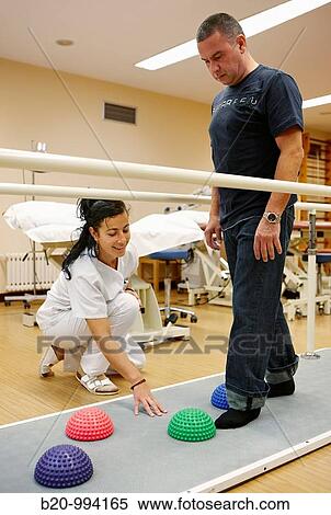 Proprioception training, reeducation exercise, rebahilitation. Policlinica Gipuzkoa, San Sebastian, Donostia, Euskadi, Spain View Large Photo Image Stock Photography - Proprioception training, reeducation exercise, rebahilitation. Policlinica Gipuzkoa, San Sebastian, Donostia, Euskadi, Spain. Fotosearch