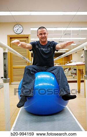 Proprioception training with exercise ball, reeducation exercise, rebahilitation. Policlinica Gipuzkoa, San Sebastian, Donostia, Euskadi, Spain View Large Photo Image Stock Photo - Proprioception training with exercise ball, reeducation exercise, rebahilitation. Policlinica Gipuzkoa, San Sebastian, Donostia, Euskadi, Spain. Fotosearch