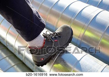 Protective boots, construction worker, Construction sheet metal pipes, Donostia, San Sebastian, Gipuzkoa, Basque Country, Spain View Large Photo Image Stock Photograph - Protective boots, construction worker, Construction sheet metal pipes, Donostia, San Sebastian, Gipuzkoa, Basque Country, Spain. Fotosearch