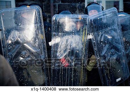 Stock Photo - Protests continued on wednesday 21/01/2009, Police protects Parliament building Demonstrators are demanding that the government step down and to have a re-election. Fotosearch