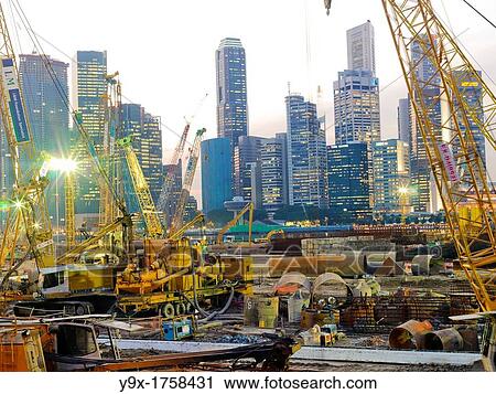 PSA Singapore Terminals is the world largest container transhipment hub, handling about one-fifth of the world's total container transhipment throughput View Large Photo Image Stock Image - PSA Singapore Terminals is the world largest container transhipment hub, handling about one-fifth of the world's total container transhipment throughput. Fotosearch