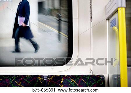 Public transport and man walking in the street View Large Photo Image Stock Image - Public transport and man walking in the street. Fotosearch