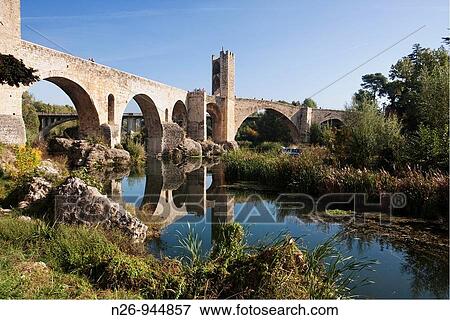 Stock Photo - Puente de Besal sobre el r? o fluvi? Siglo XI Espaa, Catalunya, provincia de Girona, la Garrotxa, Besal. Fotosearch