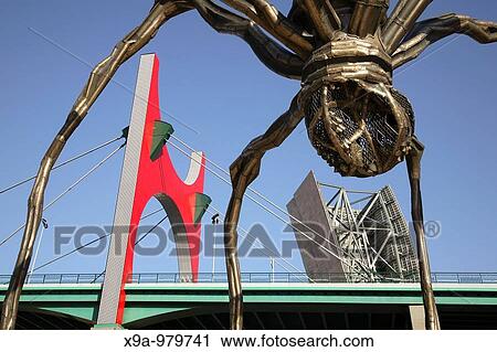Stock Image - Puente de la Salve Bridge by Buren and Spider Sculpture by Bourgeois, Bilbao, Basque Country, Spain. Fotosearch