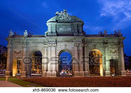 Puerta de Alcala in the evening, Madrid, Spain View Large Photo Image Stock Photograph - Puerta de Alcala in the evening, Madrid, Spain. Fotosearch