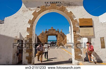 Puerta de la Caleta, entrance to the promenade to the Castle of San SebastiBn, Castillo de San SebastiBn, Atlantic Ocean, CBdiz City, Costa de la Luz, Province of CBdiz, Andalusia, Spain View Large Photo Image Stock Image - Puerta de la Caleta, entrance to the promenade to the Castle of San SebastiBn, Castillo de San SebastiBn, Atlantic Ocean, CBdiz City, Costa de la Luz, Province of CBdiz, Andalusia, Spain. Fotosearch