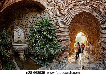 ? Puerta de los Cuartos de Granada?. Alcazaba. MBlaga. Costa del Sol. Andaluc? a. Spain. View Large Photo Image Stock Photo - ? Puerta de los Cuartos de Granada?. Alcazaba. MBlaga. Costa del Sol. Andaluc? a. Spain.. Fotosearch